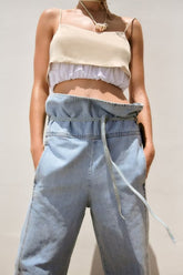 Jean taille haute plissé avec ceinture